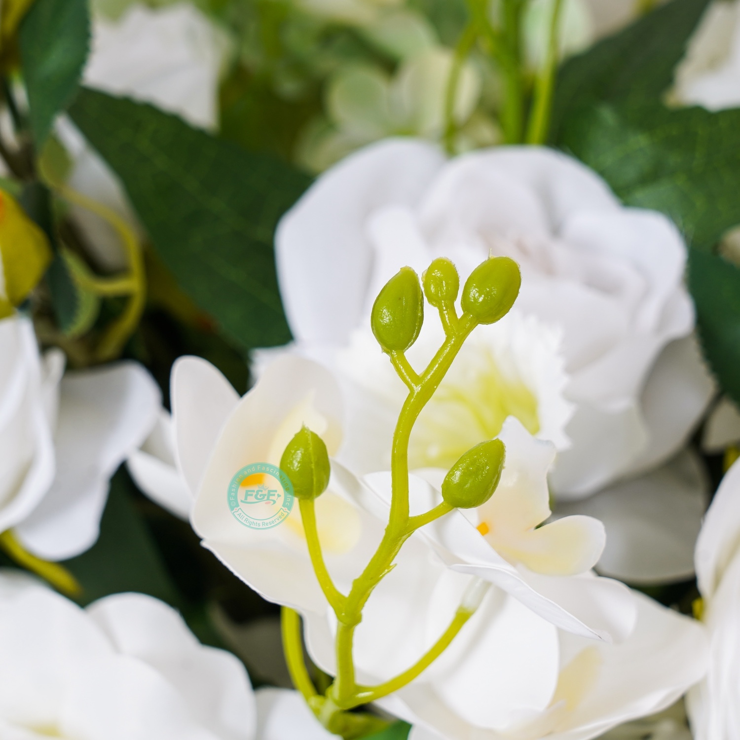 Close-up of premium artificial white orchid flower arrangement ball showing lifelike cascading Phalaenopsis petals.