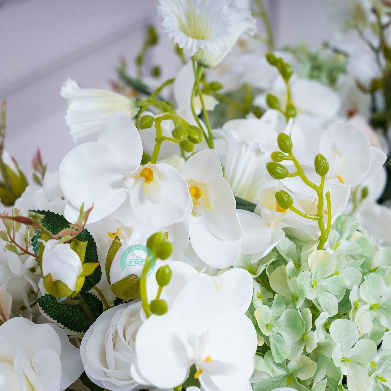 Close-up of premium artificial white orchid flower arrangement ball showing lifelike cascading Phalaenopsis petals.