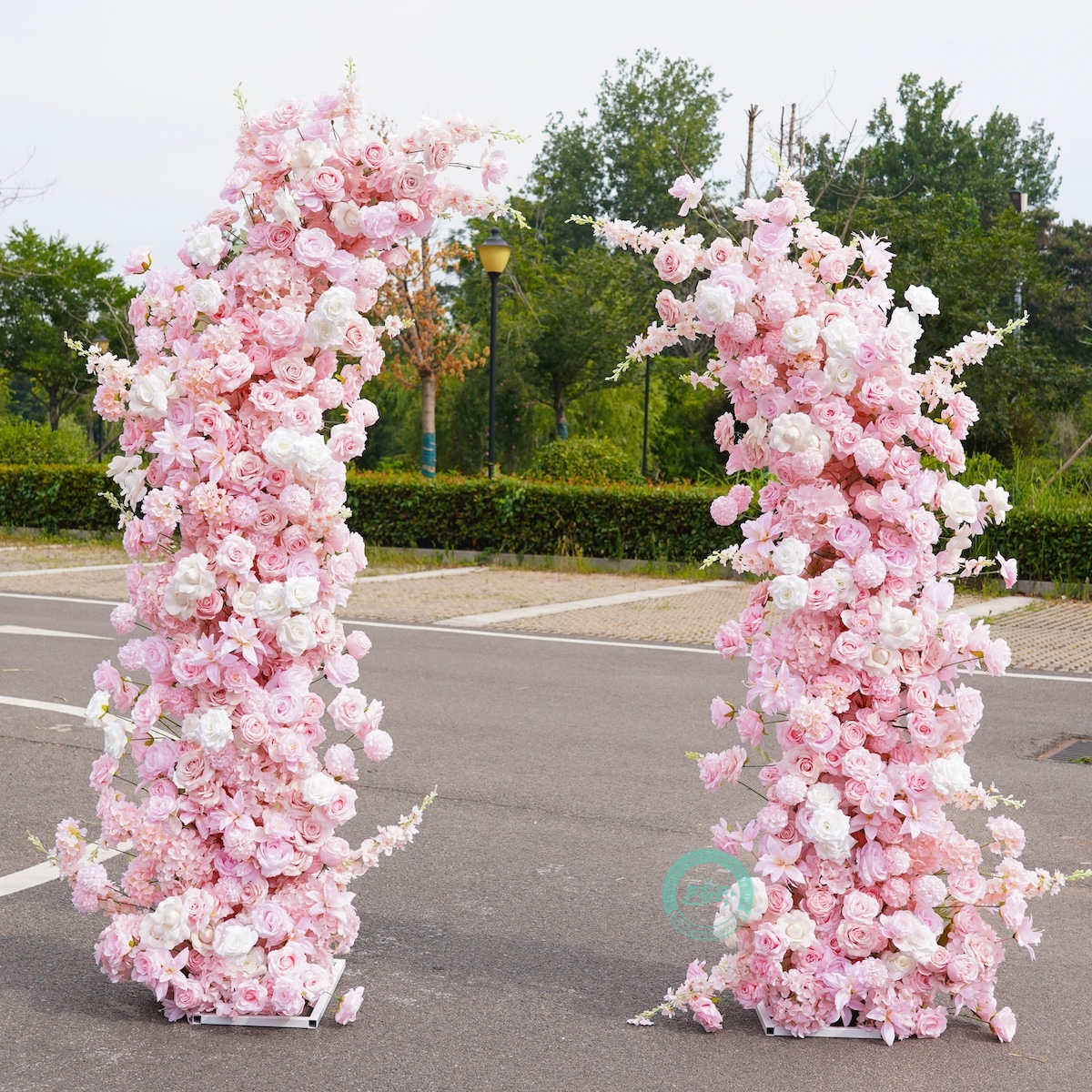 White Horn Wedding Arch with Pink Flowers