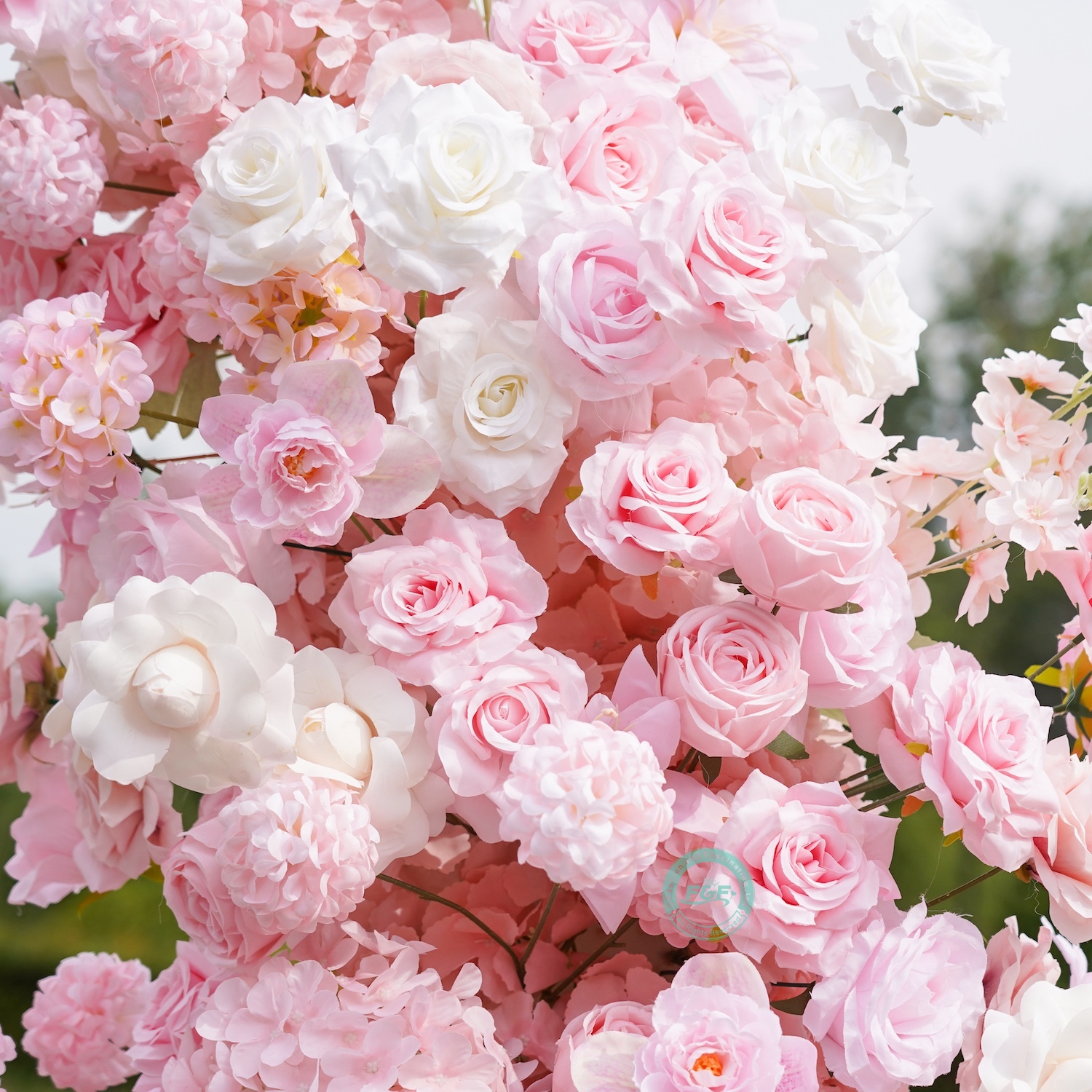White Horn Wedding Arch with Blush Pink Flowers